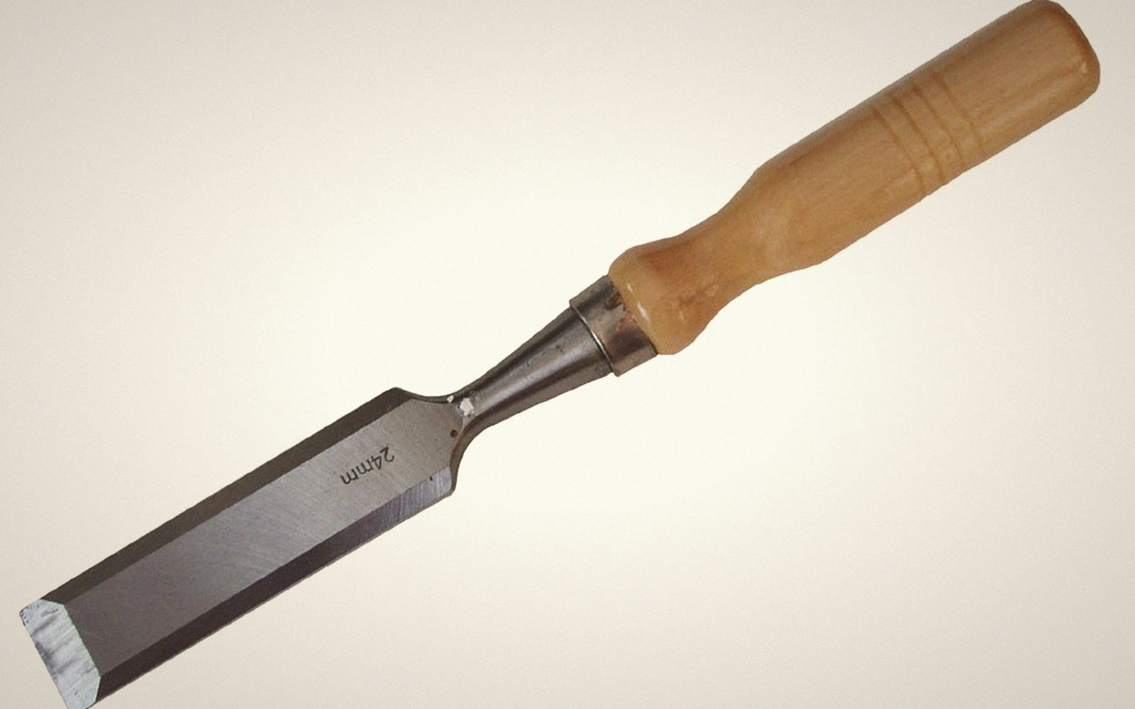 A 24mm wood chisel with a wooden handle and beveled steel blade