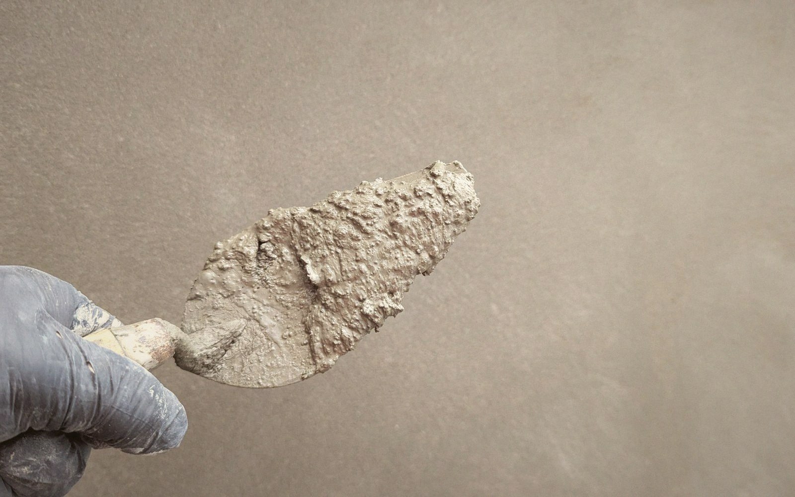 A hand-floated lime plaster wall, part finished